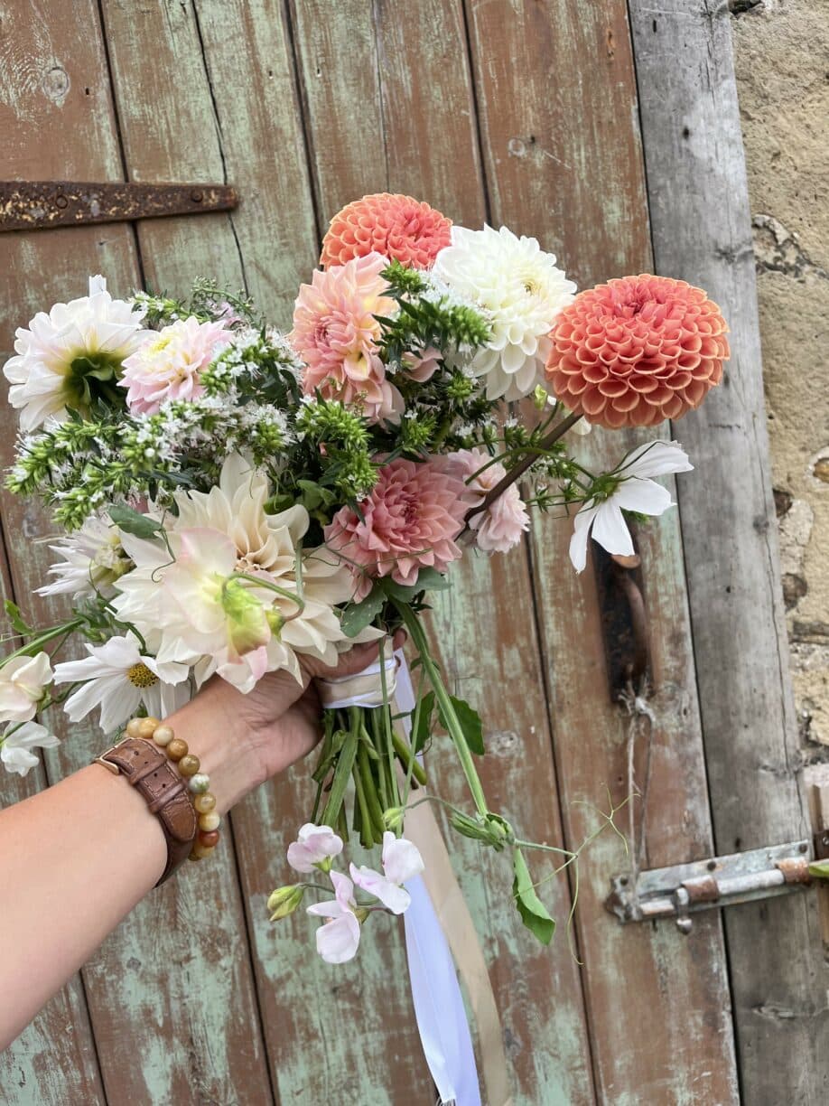 Hand-tied floral arrangements with periwinkle barn at Raby Castle, Park and Gardens